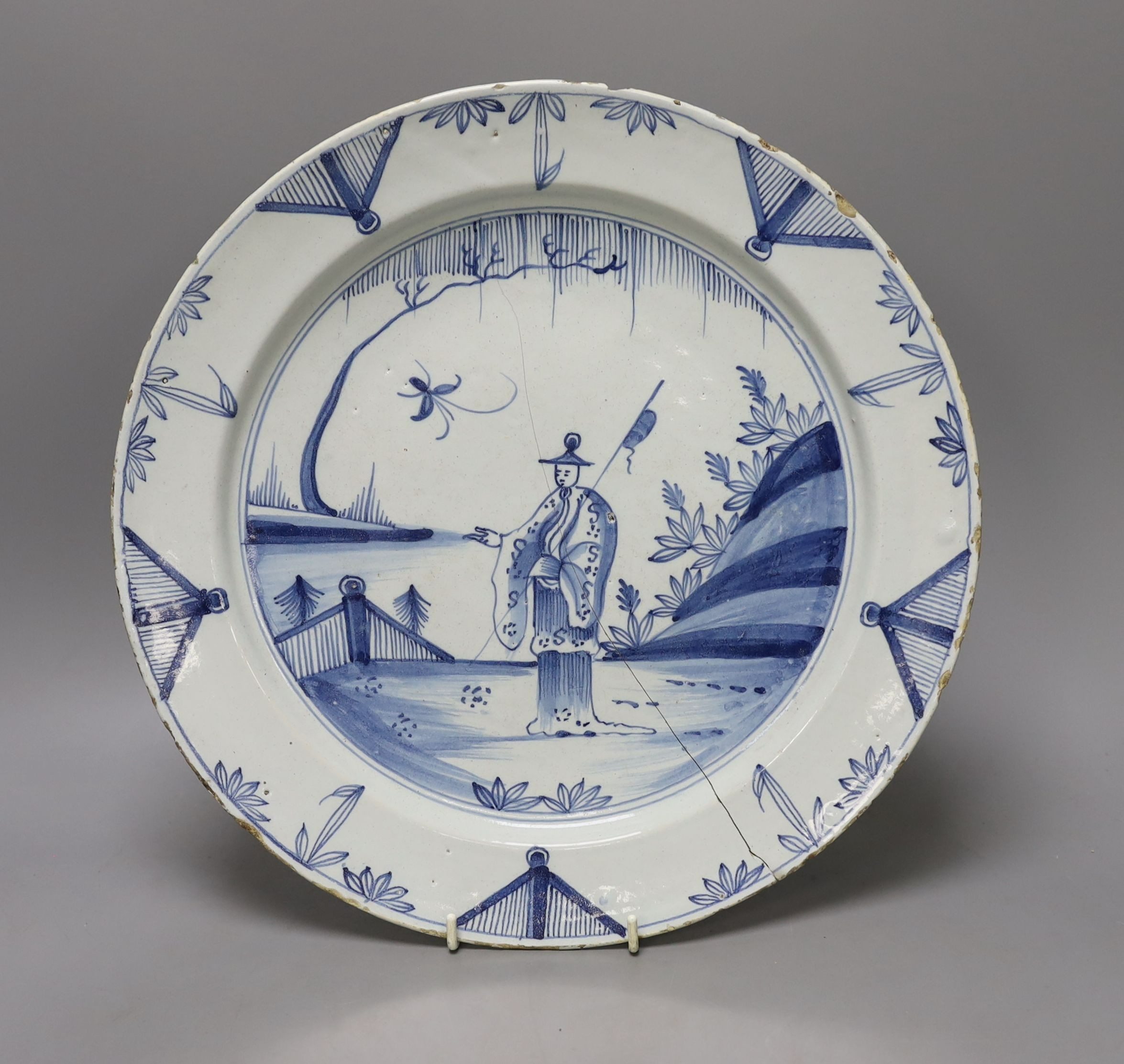 Two 18th century English delftware chargers - 33.5cm diameter